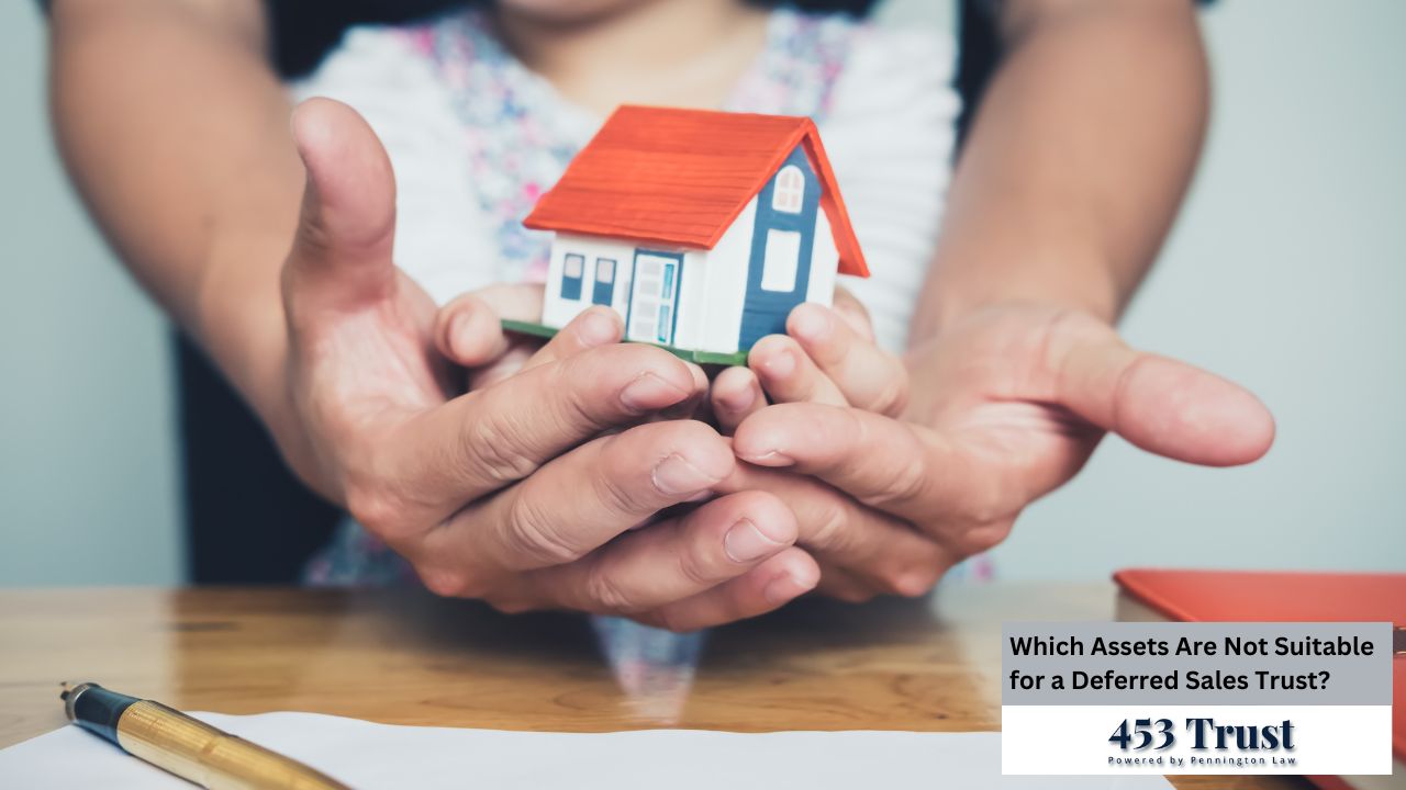 An adult's hands are protectively holding a small model house in front of a child, symbolizing security and possibly related to real estate or financial planning.