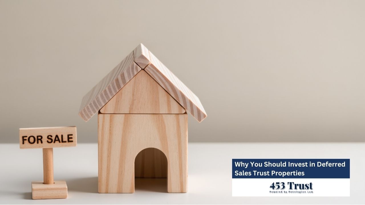 The image shows a miniature wooden house with a "For Sale" sign, symbolizing real estate investment opportunities.